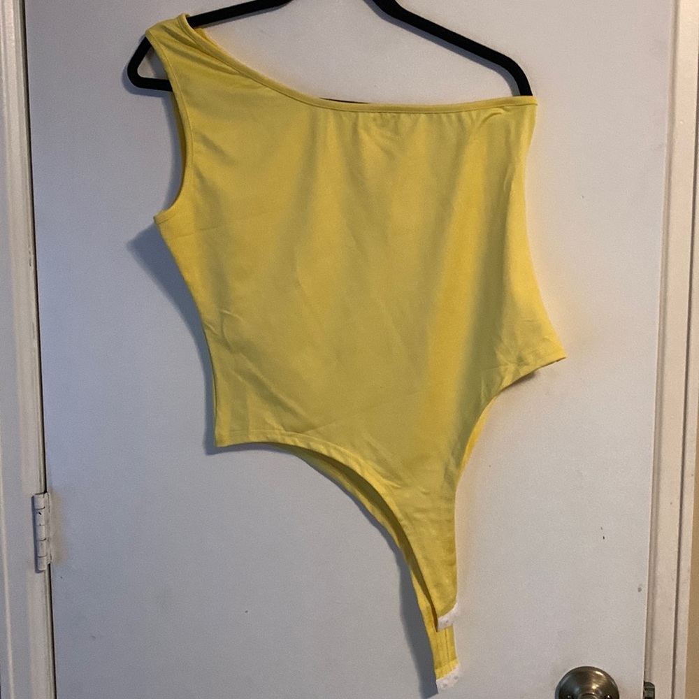 Yellow XL bodysuit.  Never worn